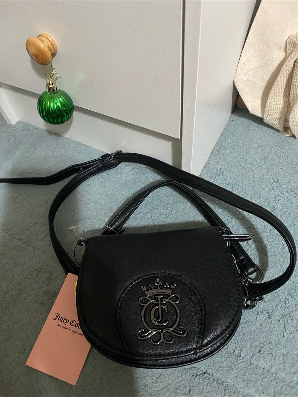 Juicy Couture Black Round Crossbody with Crest Emblem